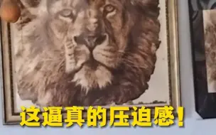 手艺人用烙铁在宣纸上作画，烫出雄狮栩栩如生