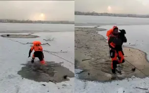 流浪狗掉进冰窟窿 救援人员破冰营救