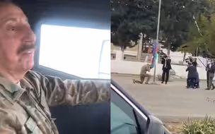 阿塞拜疆总统驾车视察纳卡地区 跪地亲吻国旗