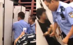 男子躲女厕偷拍被抓拒不承认 民警霸气回怼：不拍你跑到女厕所干嘛