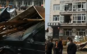 哈尔滨巴彦县疑遭龙卷风袭击 楼房窗户整面碎裂 活动板房被掀翻砸中轿车