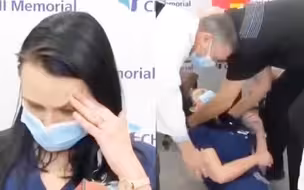 现场！美国女护士接种辉瑞疫苗感觉眩晕 直播中没走两步突然倒地