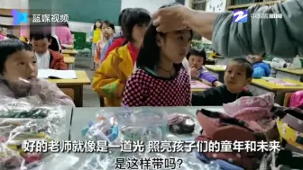 乡村老师给寄宿学生庆生 笨拙戴上生日帽