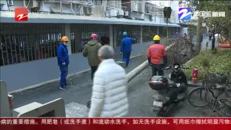 杭州居民小区再“净空”  居民说晒被子能见到太阳了