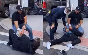 美国警察暴打违规黑人 自己却没戴口罩