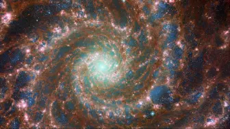 点点星光汇成星际漩涡！3200万光年外“幻影星系”全彩图像公布