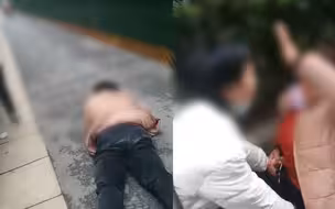女子犯病当街殴打女儿并要求其下跪 情急之下出租车司机出手相救