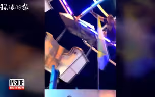 摩天轮翻转90度卡半空 工作人员抢救惨摔坠地