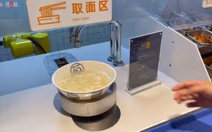 “机器人做饭”不再是科幻片，全国首家社区AI食堂人气火爆