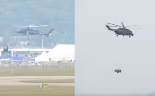 直20展示低空悬停投送兵员