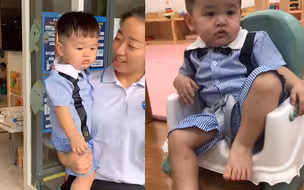 萌娃上幼儿园不哭不闹 大佬坐姿一脸淡定 点着脚丫看别的小朋友哭