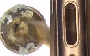通过显微镜看清理手机污垢小细节 众多网友感叹：过程引起舒适！