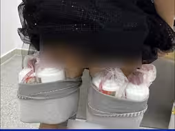 女子腿绑4瓶茅台企图入境 因走姿异常被海关发现