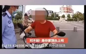 女子骑电动自行车不戴头盔还对交警耍横：我女婿是你顶头上司