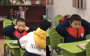 一年级小豆丁“美容式”做眼保健操 态度认真手法各异 可爱到犯规
