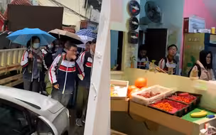 学校门口堵车了 水果店老板不顾地板被踩脏 暖心招呼学生进店绕行
