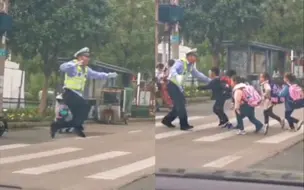 可可爱爱!交警“雀跃式”接孩子过马路 弯腰张开双臂将孩子护在胸前