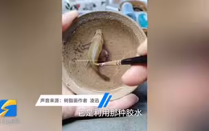 牛！80后小伙用胶水作3d金鱼画 逼真到猫看了会去舔