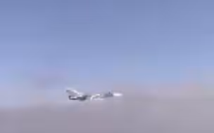 打“招呼”？俄战机从美军舰旁低空掠过