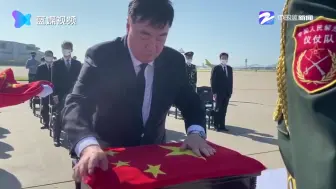回家！在韩志愿军烈士遗骸棺椁覆盖国旗