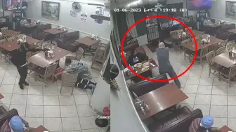 美国黑人劫匪持假枪大摇大摆闯进餐馆 顾客掏出真枪连开九枪反杀